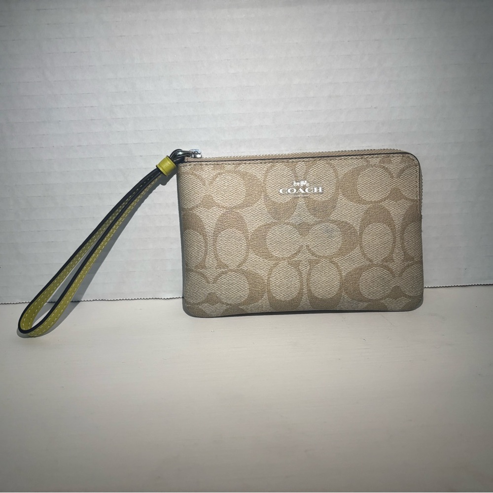 Coach corner zip wristlet beige or tan